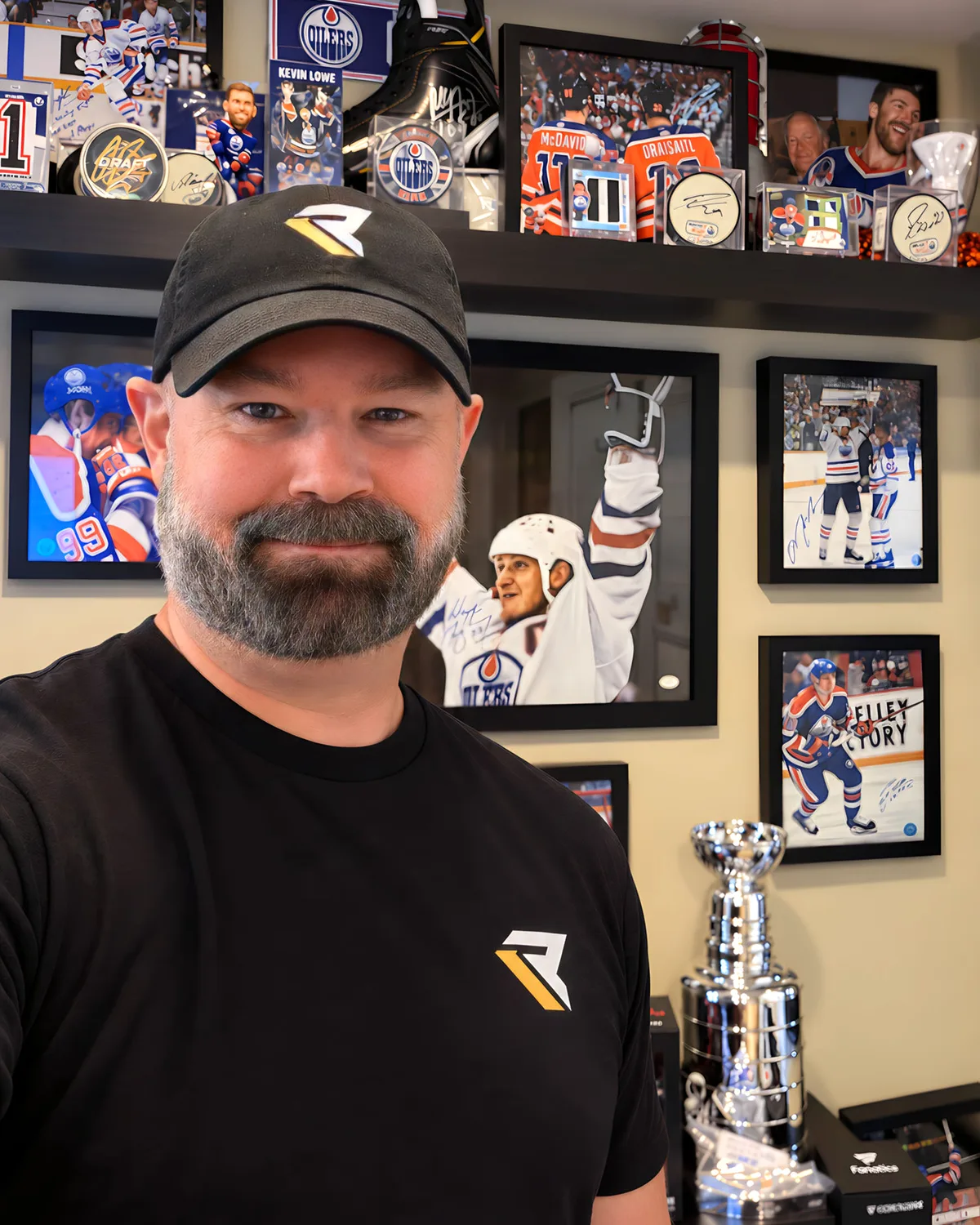 Relic Roster founder Scott Hicks with part of his sports memorabilia collection